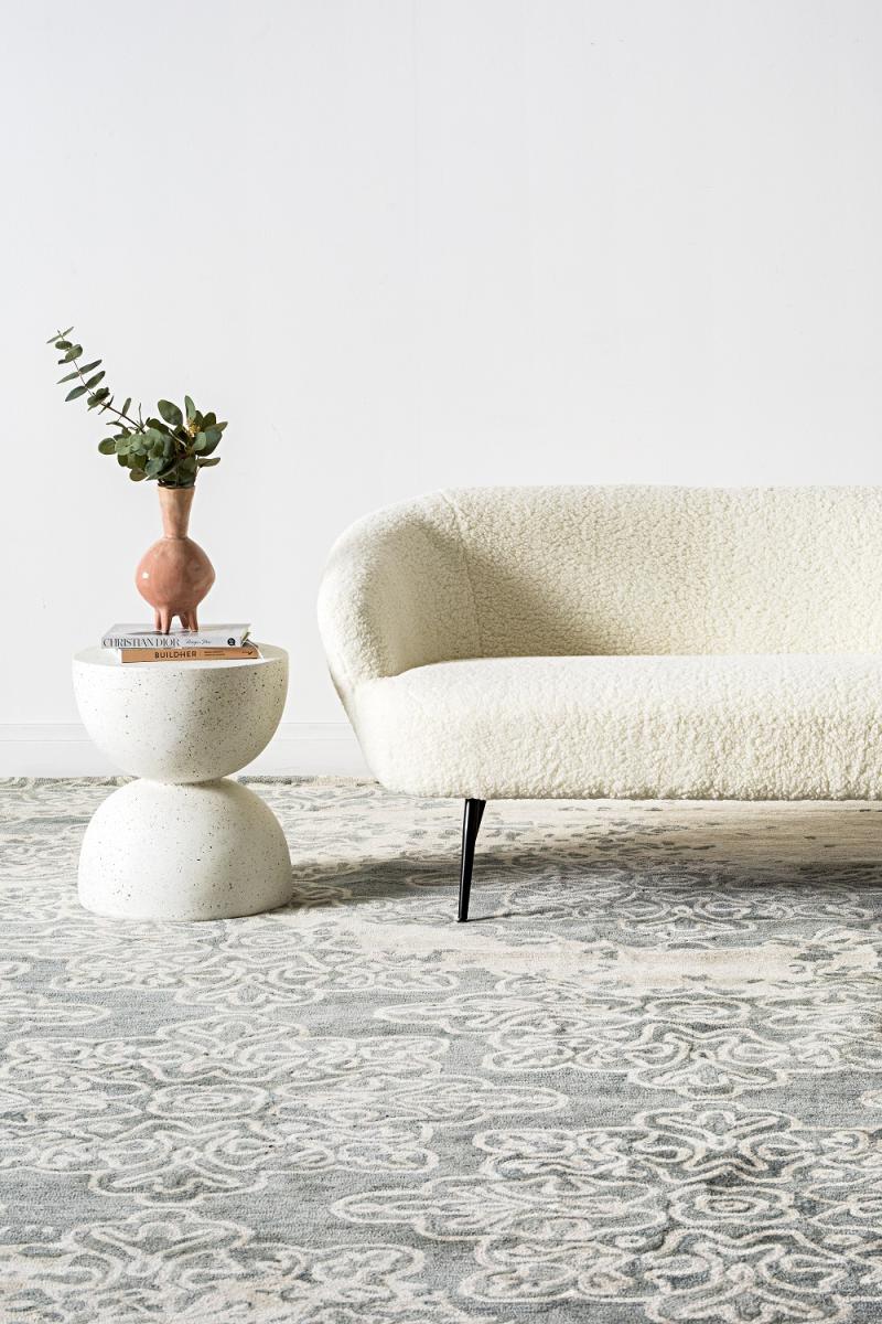 White couch and side table